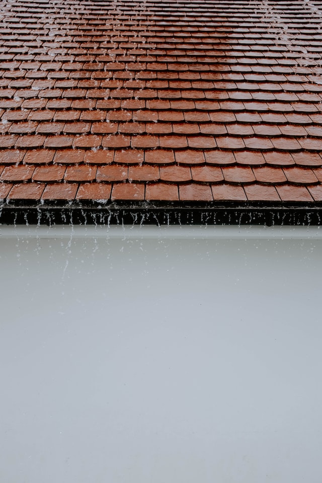 water running off a tiled roof
